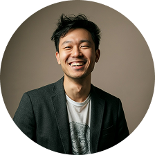 smiling individual in blazer 2.png